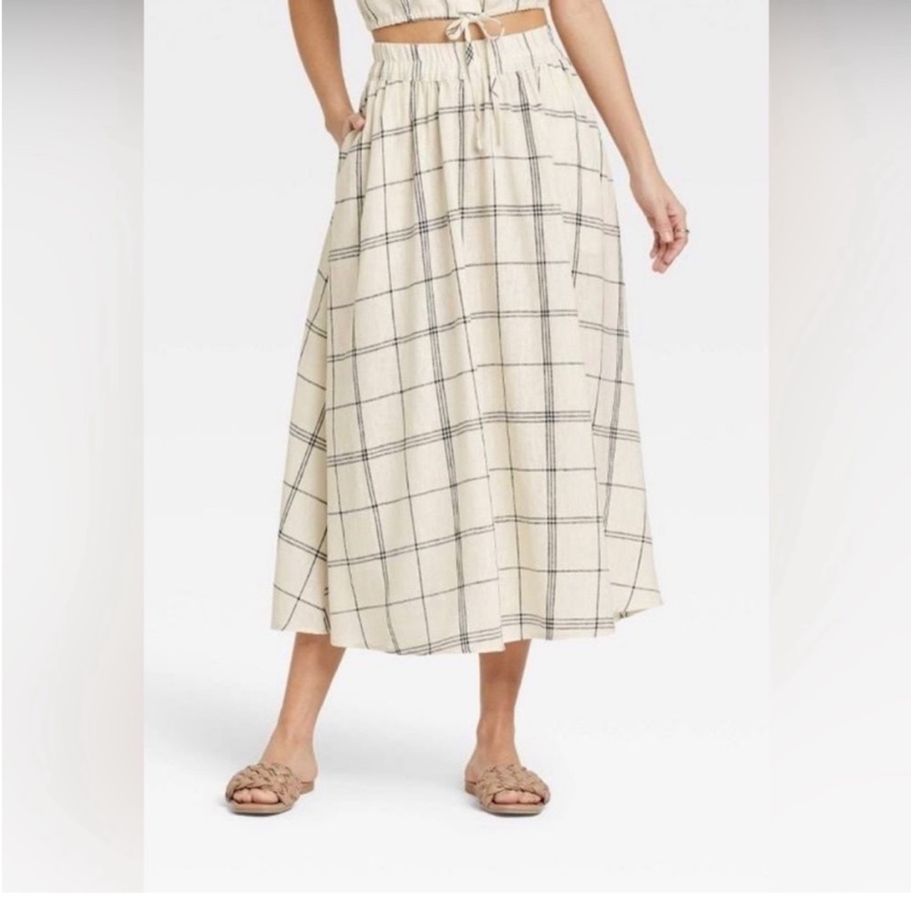 A New Day long skirt. Size Medium. New with tags. Cream and dark grey plaid